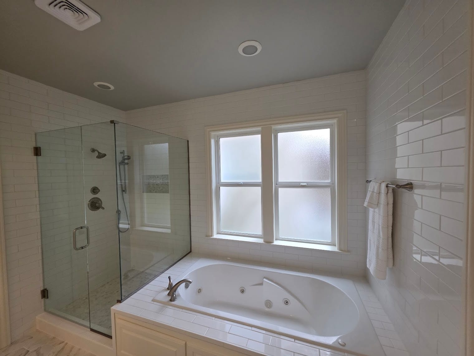 White subway master bath